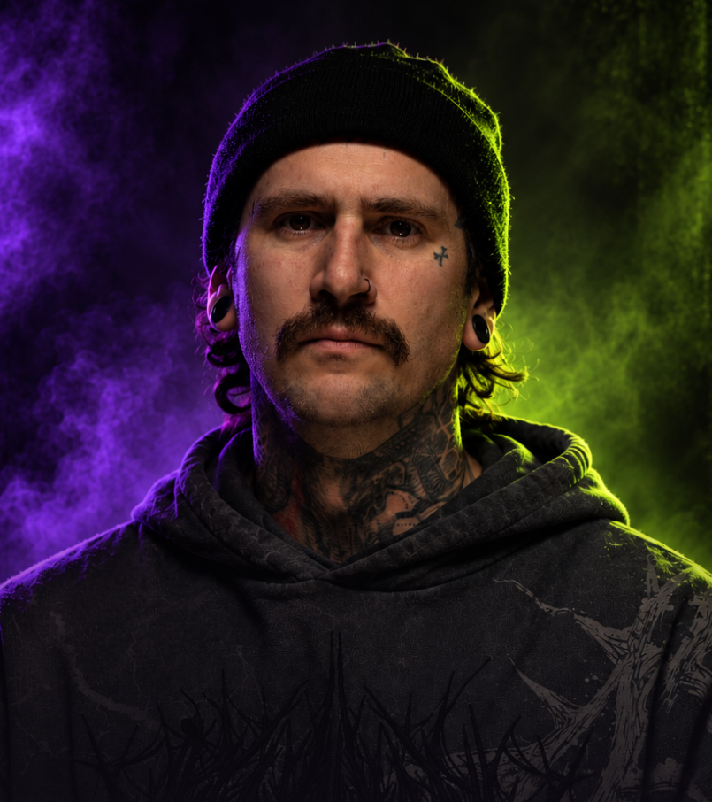 Portrait of Andreas Ullmann surrounded by violet and lime smoke